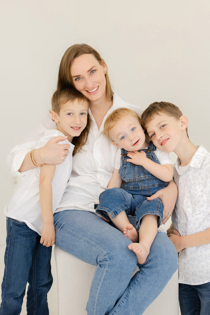 Ripon studio motherhood: a woman and two children posing for a picture