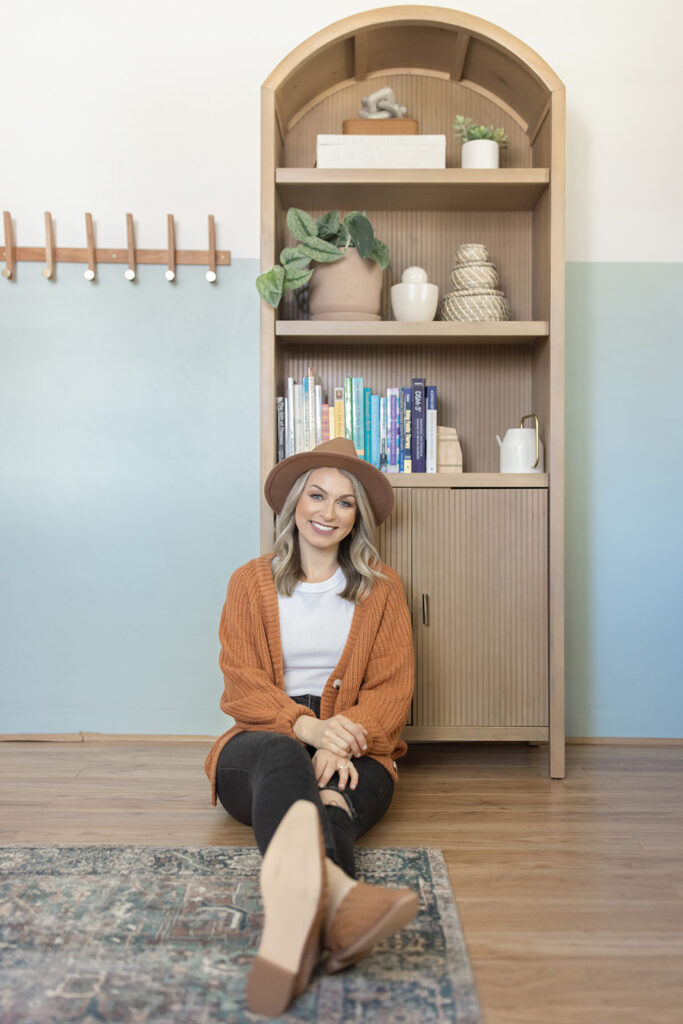 a woman sitting on the floor