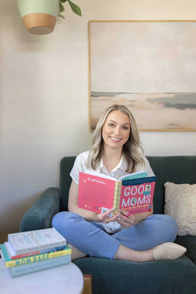 a therapist sitting on a couch reading a book