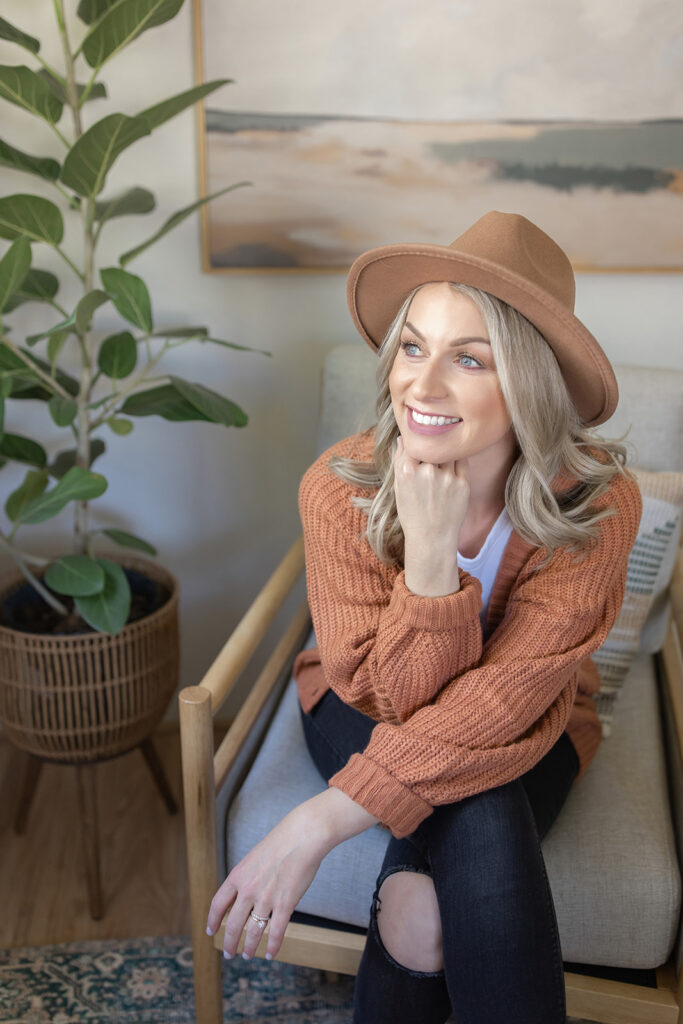 a woman sitting on a couch