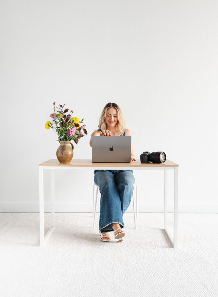 Person working at a minimalist desk.