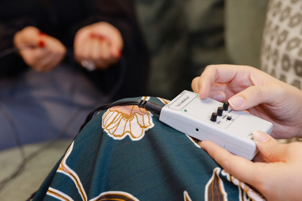 Sacramento EMDR therapist demonstrating eye movement desensitization technique — brand photography for private practice