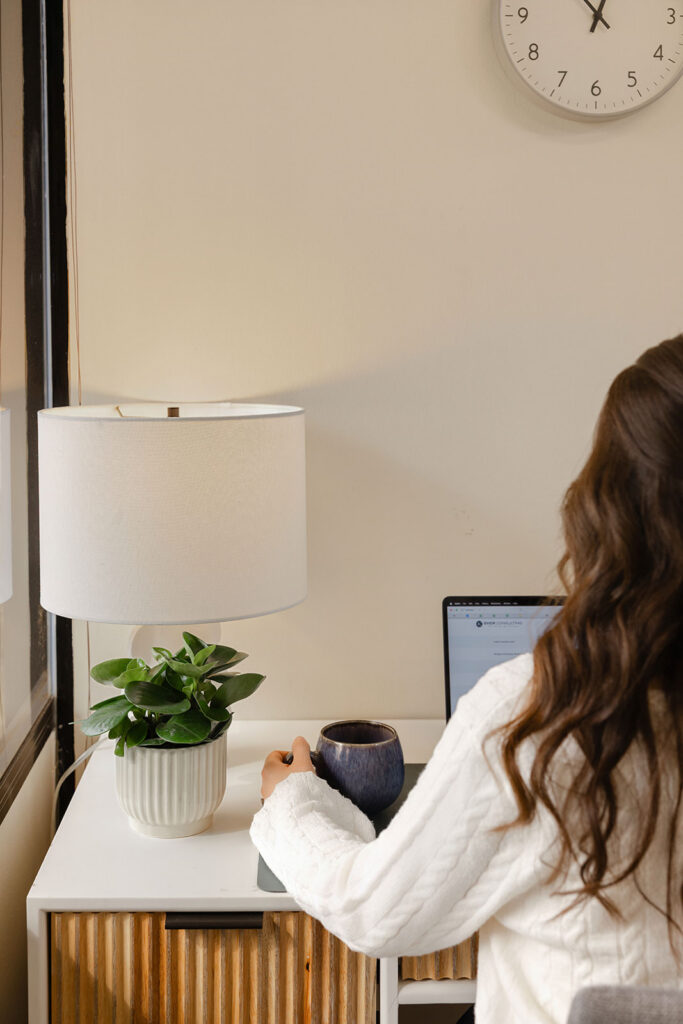 Warm lifestyle branding photo of Sacramento therapist with coffee mug — personal brand photography for mental health professionals