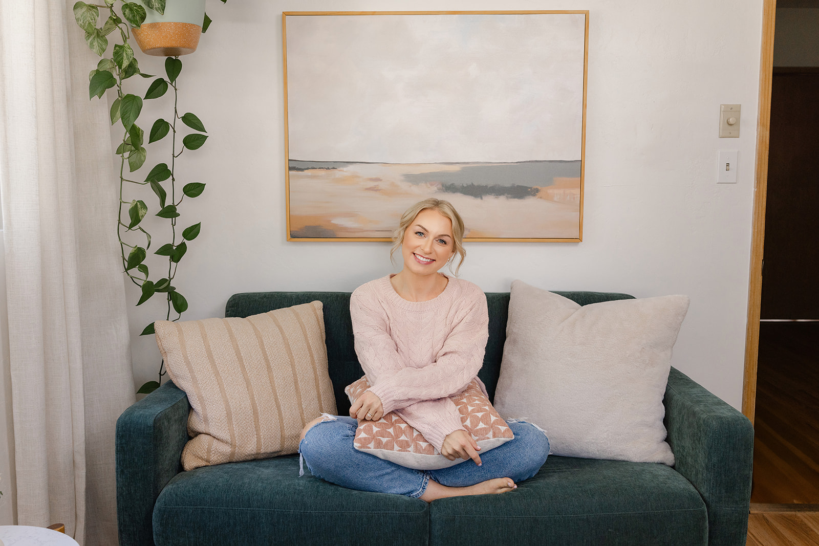 Brand photographer for therapists in Sacramento — warm, natural portrait of a therapist in her private practice office