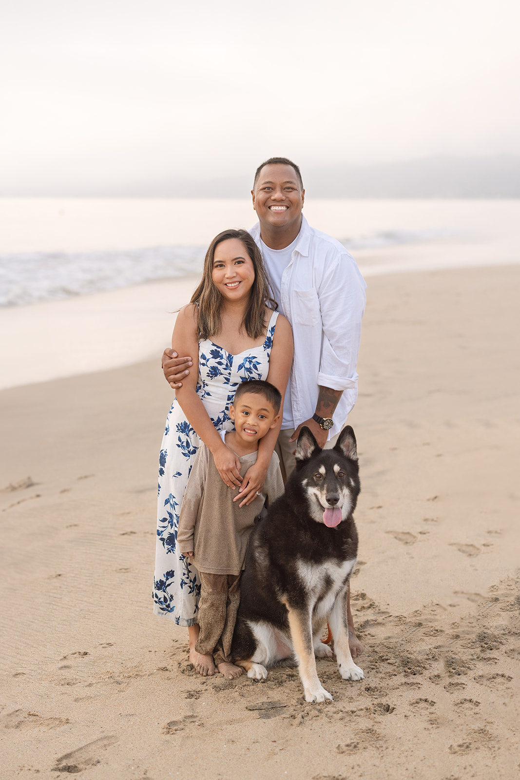 family photo session at half moon bay beach with dog